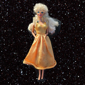 Barbie Doll Vintage 1976 with green jewelry and a Yellow Dress